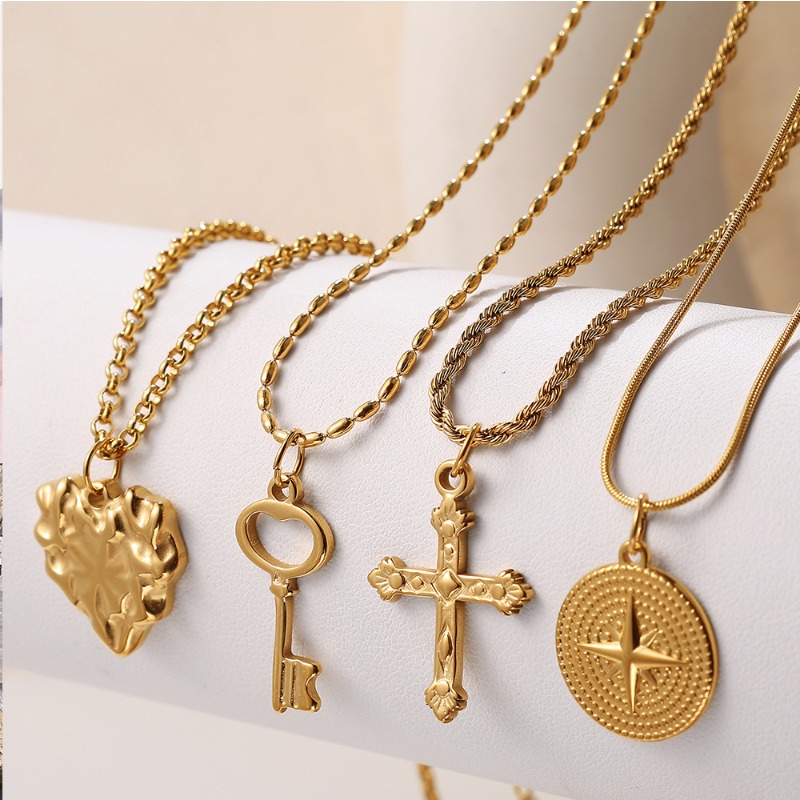قطعة واحدة من قلادة الفولاذ ال - مراجعة Cross Pendant Necklace Gold وسعره