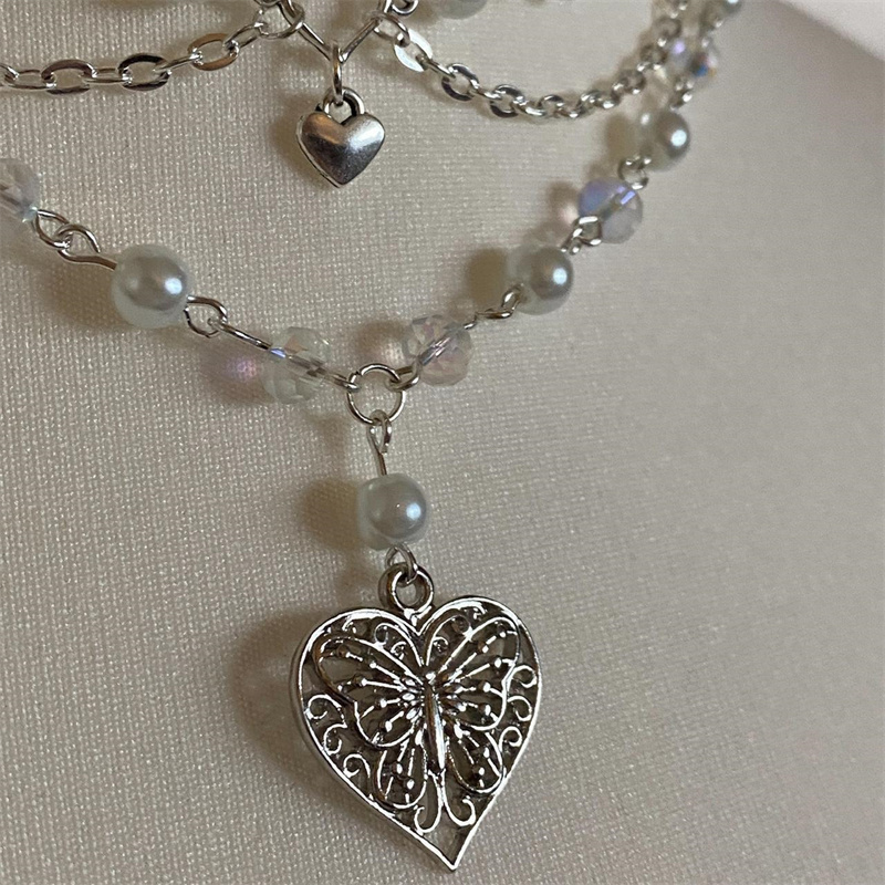 فراشة لؤلؤ القلب قلادة للنساء  - مراجعة Pearl Choker Necklace Vintage وسعره