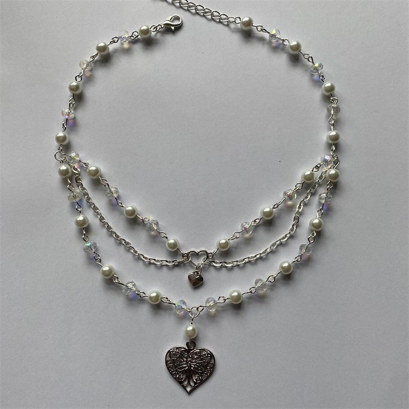 فراشة لؤلؤ القلب قلادة للنساء  - مراجعة Pearl Choker Necklace Vintage وسعره